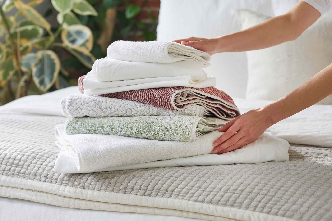 Sort household linens into compatible loads: Assess whether sheets and towels can share a load