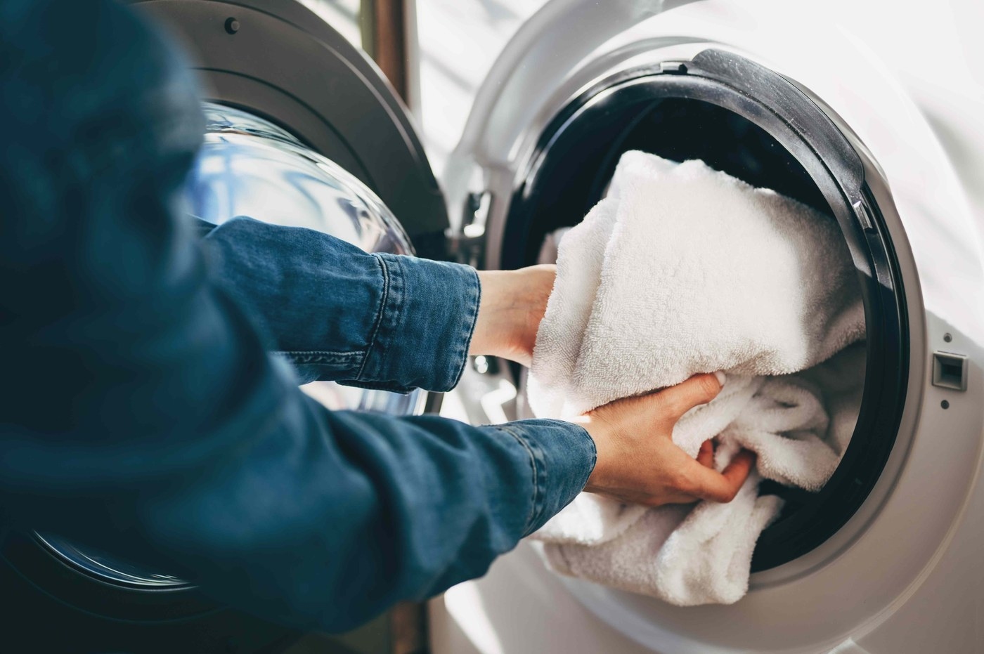 Dry towels fully without unnecessary heat: Dry heavy towels separately from lighter textiles